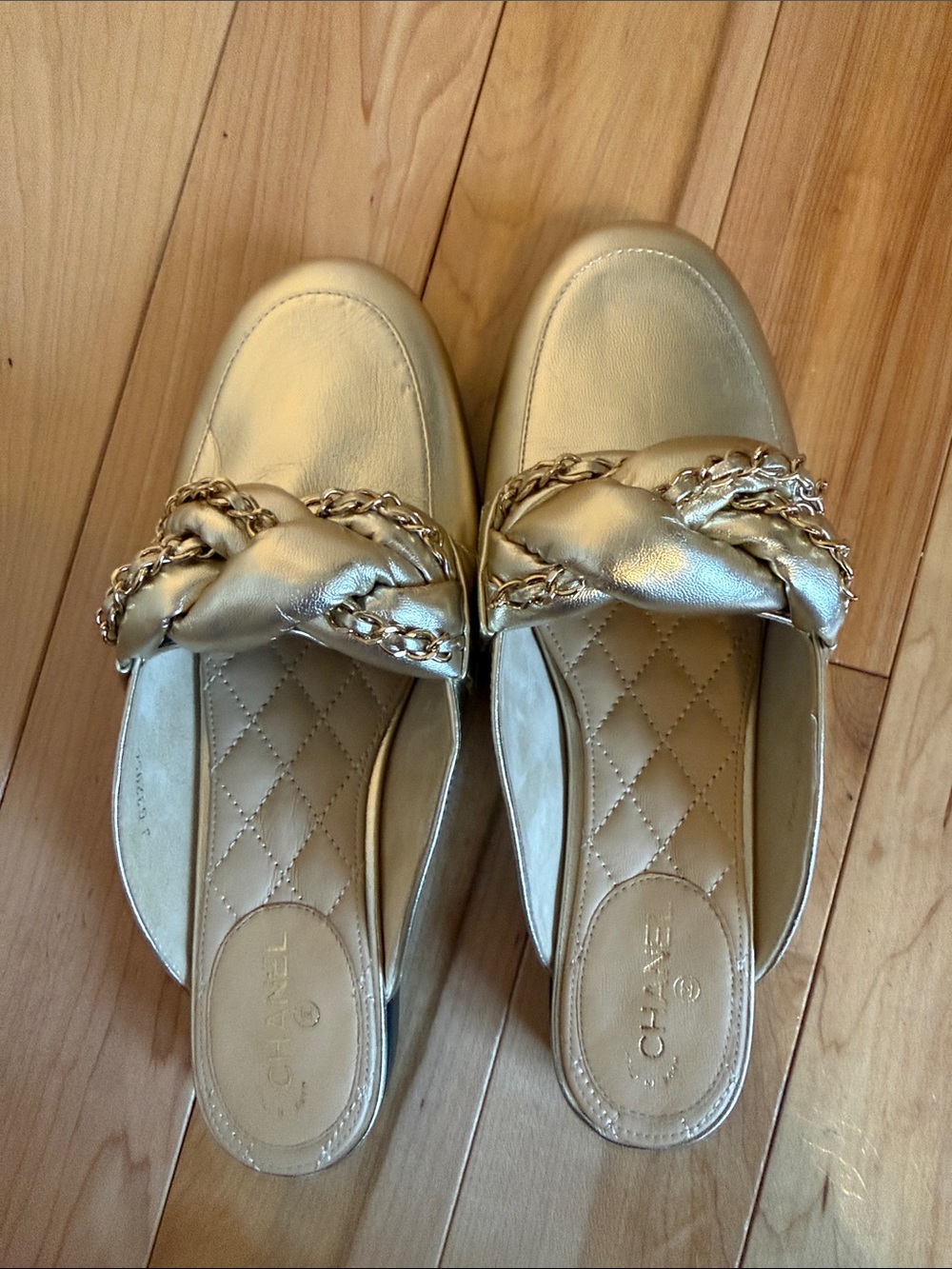 CHANEL Gold Quilted Leather Chain-Trim Mules
